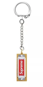 SUPREME HOHNER KEYCHAIN (SILVER) FW20 FRAZETTA SOCCER JERSEY TRUCKER CAMP ZIP - Picture 1 of 7