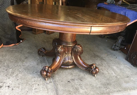 54” CARVED OAK HASTINGS DINING TABLE, WITH 3-9” LEAVES Cover