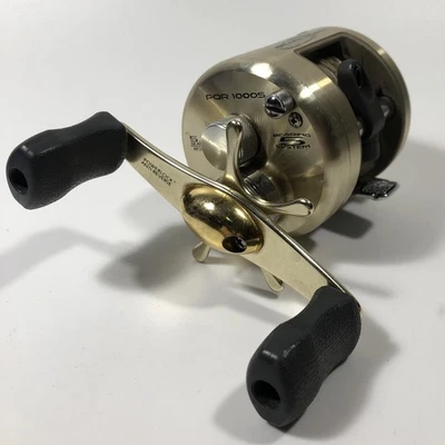 Bass Pro Shops PQR 1000 S PRO QUALIFIER FISHING REEL Baitcast RHH Gold Tone - Image 1 of 4
