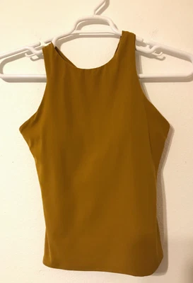 Sujetador incorporado Athleta Conscious sin mangas talla pequeña amarillo mostaza cuello alto corredor Foto 1 de 4