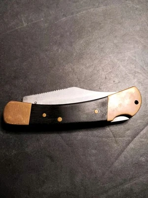 Navaja de bolsillo plegable BUCK Lockback de ébano y latón de 8" Foto 1 de 3