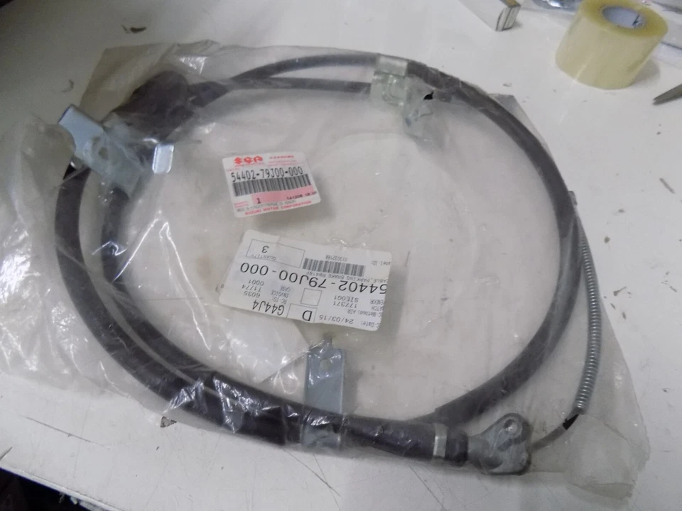 ПОДЛИННЫЙ подходит для Suzuki SX4 левый задний трос ручного тормоза 54401-79J00 - Изображение 1 из 1