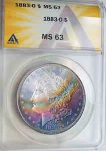 Dollaro Morgan argento tono arcobaleno 1883-O ANACS MS63 APPARISCENTE PL - Foto 1 di 4