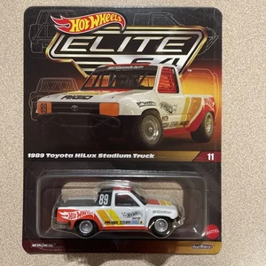 Hot Wheels 1989 Toyota Hilux Stadium Truck Elite 64 W/Protector 2024 RLC - Picture 1 of 8