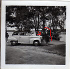 Oldtimer Auto Opel Olympia Cabriolet mit junger Dame am See. Bild aus Fotoalbum