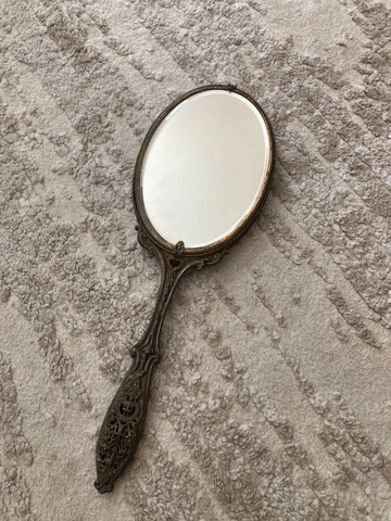 Antique hand mirror with ornate decorative handle - oval mirror, floral filigree Cover