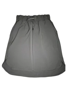 Gonna Lululemon On The Fly *21" sfoderata elasticizzata orlo curvo elastico in vita taglia 4 - Foto 1 di 13