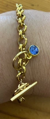 CHRISTMAS HOLIDAY Gold Tone Toggle Bracelet With Blue Crystal Stone 8” - Image 1 of 4