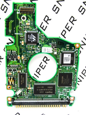PCB - Toshiba 30GB MK3018GAS (HDD2169 B ZE01 T) G5B000043 A1/Q3.03B Hard Drive - Image 1 of 4