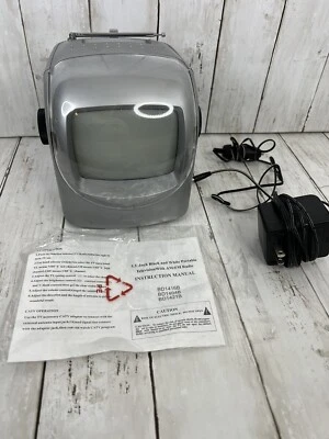 Sintonizador de radio AM/FM portátil negro/blanco TV 5,5" sin marca enchufe y adaptador para automóvil Foto 1 de 4