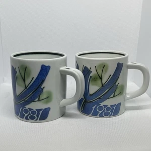 Two Royal Copenhagen 1981 Ellen Malmer 3” Tall Annual Porcelain Mugs Model 3495 - Picture 1 of 11