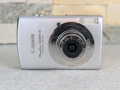 Canon PowerShot Digital ELPH SD870 IS 8.0MP Digital Camera black dot on screen 3 - Image 1 of 4
