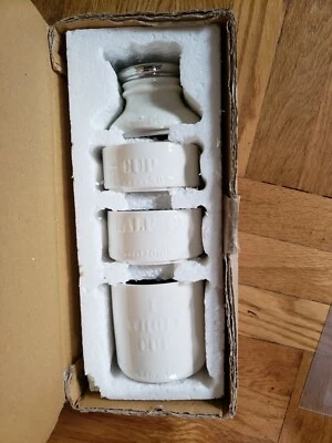 Taza medidora de botellas de leche de cerámica Foto 1 de 4