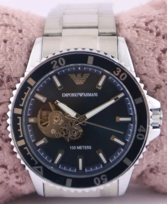 Reloj pulsera de lujo Armani automático con bisel giratorio esfera azul para hombre correa de acero Foto 1 de 4