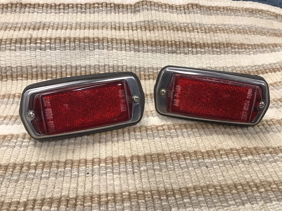 Par de luces marcadoras laterales traseras rojas Datsun OEM 240Z 260Z 280Z 1970-78 Foto 1 de 4