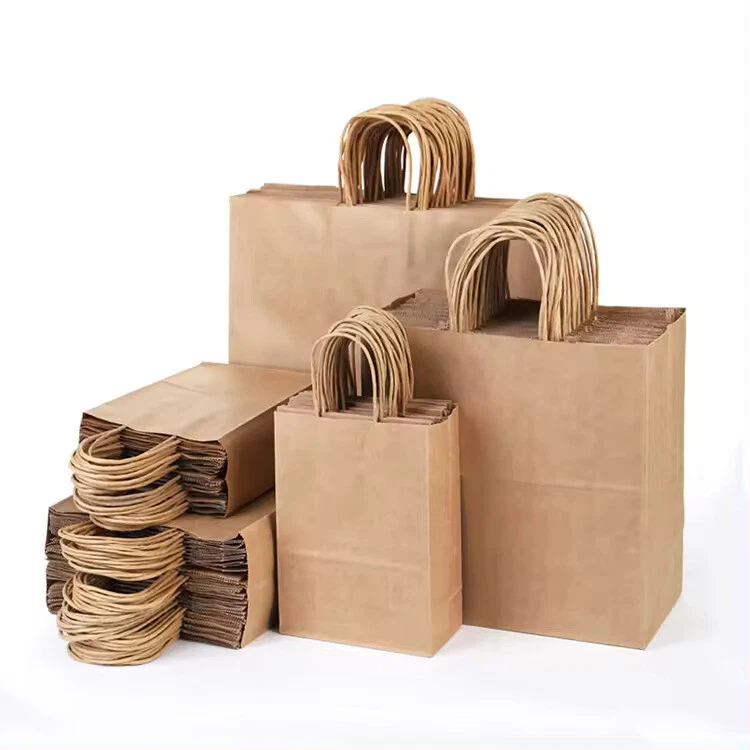 Paper Bags with Twisted Handle Brown Kraft Carrier Bag for Gift Christmas Cloths - Image 1 of 4
