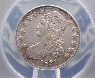 Монета номиналом 50 центов 1831 с изображением бюста и крышкой ANACS AU50 детализация No913 не бывшая в обращении - Изображение 1 из 4