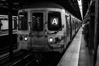 8x10 B&W of the A train arriving at a Subway stop in Manhattan, New York.