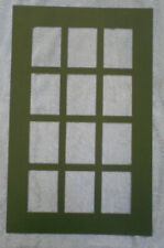 #OO.   STANDARD CARD SIZE FRAMING MAT - TWELVE  HOLES, DARK GREEN