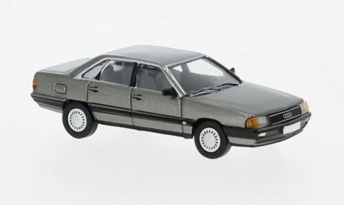 Brekina/PCX87 PCX870439 - 1/87 Audi 100 (C3), Grigio Scuro, 1982 - Nuovo - Immagine 1 di 1