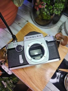 Cámara fotográfica Ricoh Singlex TLS 35 mm SLR, funciona pero lee - Imagen 1 de 8