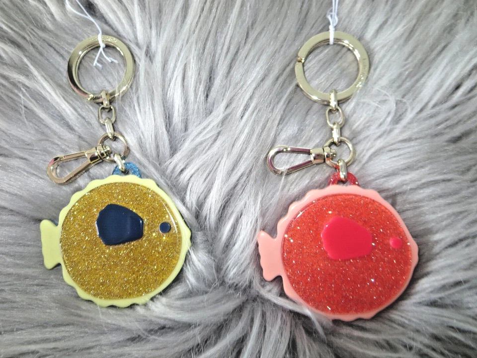 KATE SPADE BRILLO PEZ GLOBO LLAVERO ENCANTO-ELECCIÓN DE CORAL O AMARILLO-$68+ Foto 1 de 1