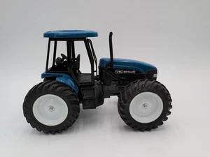 Tractor bidireccional New Holland TV140 modelo granja juguete escala 1/16  - Imagen 1 de 4