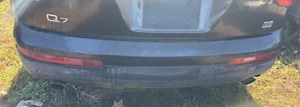 2007-2009 AUDI Q7 REAR BUMPER ASSEMBLY LAVA GRAY PEARL P/C: Z7L OEM USED - Picture 1 of 4
