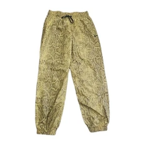 Pantalones de chándal para mujer NIKE amarillos con estampado de piel de serpiente con cordón talla S - Imagen 1 de 7