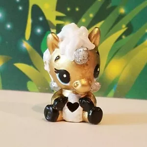 Hatchimals Colleggtibles - RIDIPINTA Unikeet d'oro (unicorno) con lince uovo tratteggiabile - Foto 1 di 2