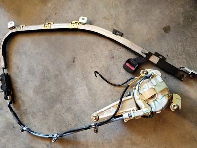 94 95 96 1994 FORD ESCORT SEDAN RIGHT PASSENGER FRONT SEAT BELT DOOR TRACK MOTOR - Image 1 of 4