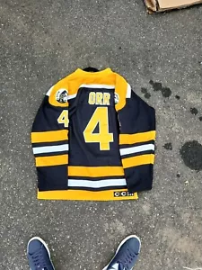Vintage CCM Bobby Orr BOSTON BRUINS Youth Heroes of Hockey NHL Team TRIKOT 56 - Bild 1 von 5
