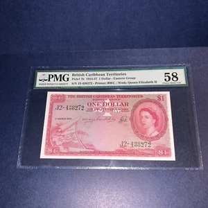 Banconota da 1 dollaro PMG Territori dei Caraibi Britannici 1954-57 p7b AU 58 - Foto 1 di 6