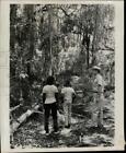 1969 Press Photo Trainer and "Send A Kid To Camp" participants tour the forest
