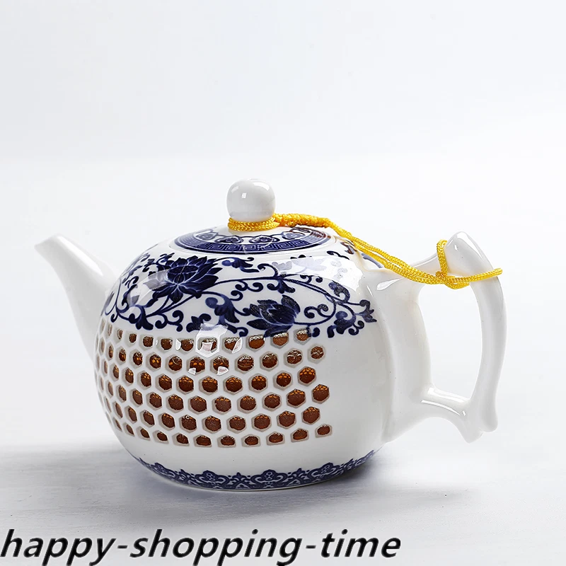 Tetera de porcelana esmalte fino diseño hueco tetera de kungfu con infusor nueva Foto 1 de 4