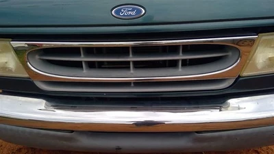 Grille Chrome Grille With Painted Inserts Fits 97-02 Ford E150 Van OEM - Image 1 of 4