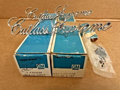 NOS 1973-1975 OLDSMOBILE CUTLASS SUPREME EMBLEMS 73 74 75 GM 231539 SET OF 2 - Image 1 of 4