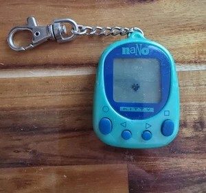 RARO Vintage Años 90 Playmates Nano KITTY Verde Mascota Virtual Batería Nueva 1997 - Imagen 1 de 2