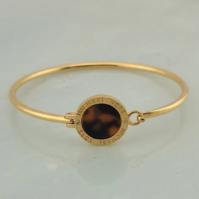 Brazalete Michael Kors tono dorado caparazón de tortuga acrílico 6,5" Foto 1 de 4