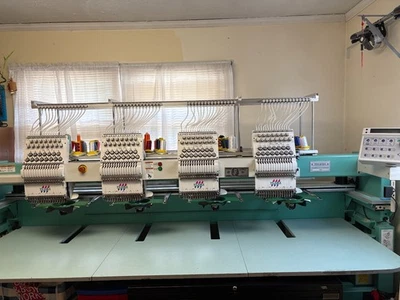 Máquina de bordar Tajima TFHX-IIC1504 2004 4 cabezales 15 agujas Foto 1 de 4