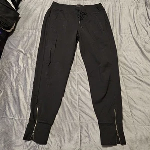 Athleta Jogginghose schwarz Strick Gummibund Reißverschlusstaschen Größe M  - Bild 1 von 7