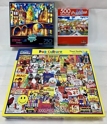 White Mountain Puzzles Pop Culture 1000 Piece, 750 Amsterdam And 500 Puzzlebug - Image 1 of 3
