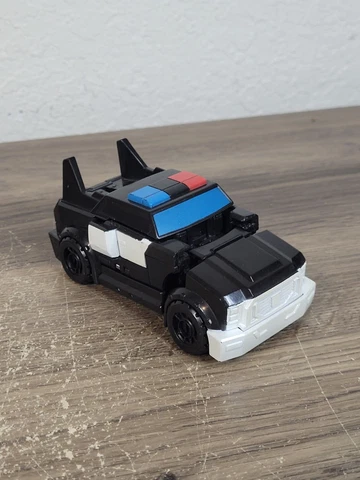 Transformers Strongarm Figure Robots In Disguise Police Patrol One Step Changer Cover