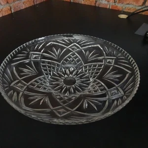A large cut glass crystal serving bowl with a detailed starburst and geometric c - Picture 1 of 7