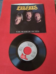 BEE GEES THE WOMAN IN YOU/ STAYIN ALIVE 45 7" JUKEBOX RECORD & PICTURE SLEEVE NM - Picture 1 of 10