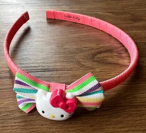 Hello Kitty Girls Pink Plastic Headband  Bow for girls 2+ - Picture 1 of 4
