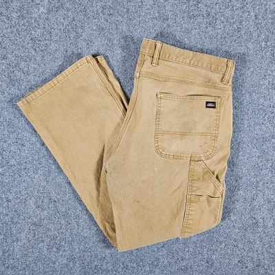 Pantalones de carpintero de lona Dickies beige para hombre etiquetados talla 38x32 defecto real 38x30 Foto 1 de 4