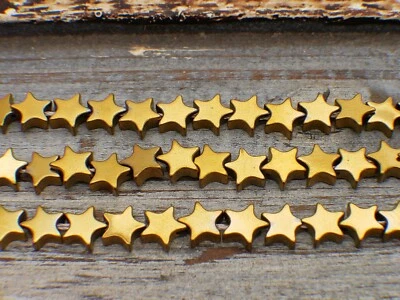 NELLYS  Strang Hämatit Perlen Sterne glänzend gold 4 u. 6mm Edelsteine - Bild 1 von 2