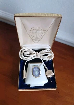 Afeitadora eléctrica vintage Lady Sunbeam con luz incorporada con estuche y cable  Foto 1 de 4