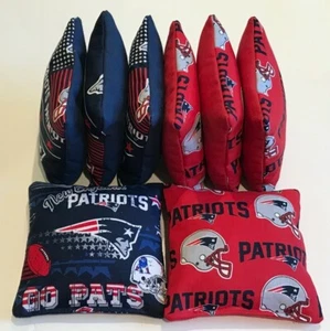 JUEGO DE 8 BOLSAS DE FRIJOLES CORNHOLE DE NUEVOS ENGLAND PATRIOTS REGULACIÓN JUEGO - Imagen 1 de 1